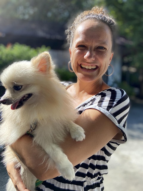 Dog groomer with Pomeranian